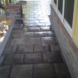 dektek tile luxury cobblestone gray concrete 