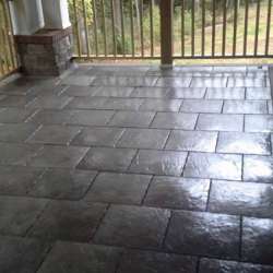 dektek tile luxury cobblestone gray concrete 