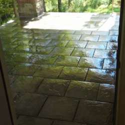 dektek tile luxury cobblestone gray concrete 