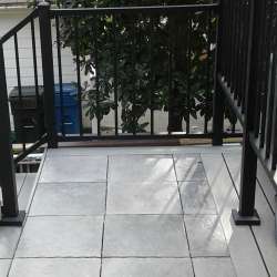 dektek tile luxury cobblestone gray concrete 