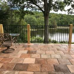 DekTek Tile's luxury concrete deck tiles shows in the color Mocha