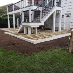 Permeable paver concrete deck tiles patio walk out basement patio installation - flood zone