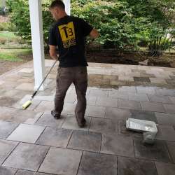 Permeable paver concrete deck tiles patio walk out basement patio installation - flood zone