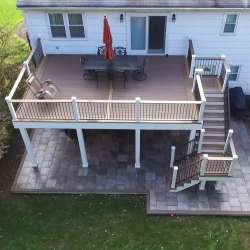 Permeable paver concrete deck tiles patio walk out basement patio installation - flood zone