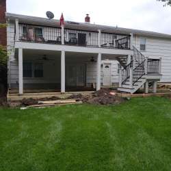 Permeable paver concrete deck tiles patio walk out basement patio installation - flood zone