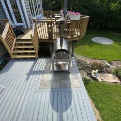 dektek tile luxury cobblestone gray concrete 