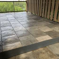 dektek tile luxury cobblestone gray concrete 