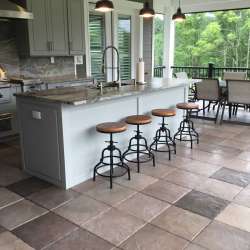 DekTek Tile's luxury concrete decking in an outdoor kitchen