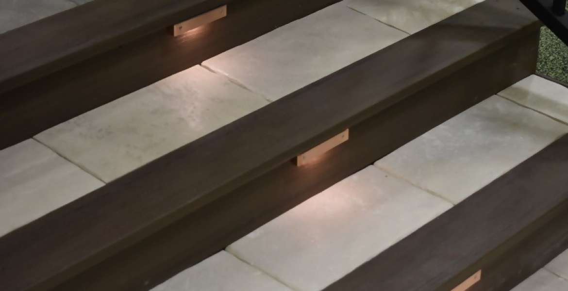 DekTek Tile concrete deck tile stairs bordered in composite decking